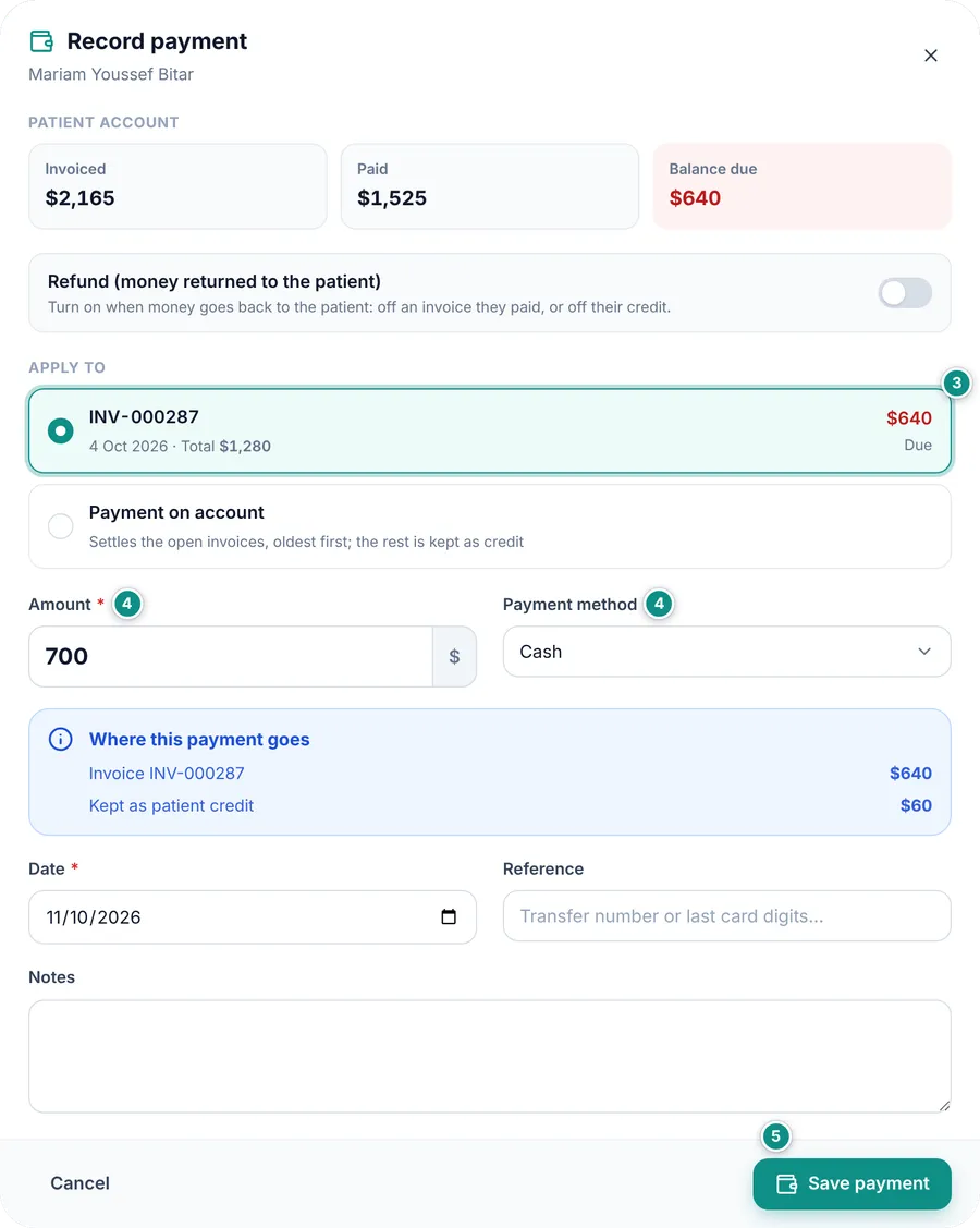 The Record payment window: the patient account, the chosen invoice, and 700 split between the invoice and credit